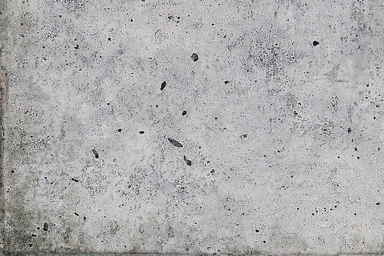 Detalle de un suelo con estampado impreso que simula hormigón industrial